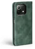 A green flip case for a smartphone is shown against a white background. Produktbild-Vorschau