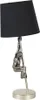 A table lamp with a black shade and a silver-colored base and pole, featuring a monkey figurine climbing the pole. Produktbild-Vorschau