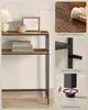 A collage of images showing details of a console table, including its surface, anti-tip device, and adjustable feet. Produktbild-Vorschau