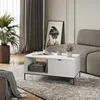 A living room scene with a couch, coffee table, plant, and artwork. Voir les images du produit
