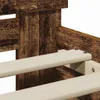 Close-up view of a bed frame with wooden slats. Produktbild-Vorschau