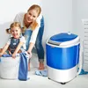 A mother and daughter are doing laundry together, with the mini washing machine in the background. Produktbild-Vorschau