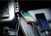 Two smartphones are charging in a car using a car charger adapter. Podgląd zdjęcia produktu