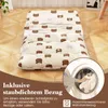 A folded mattress with a bear pattern on a wooden floor, with a close-up of a washing machine. Produktbild-Vorschau