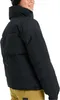 A person wearing a black puffer jacket and tan pants, shown from the side. Náhľad obrázku produktu