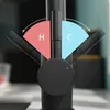 Close-up of a black kitchen faucet with indicators for hot and cold water. Produktbild-Vorschau