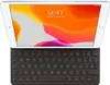 A tablet with a keyboard attached, displaying the lock screen. Produktbild-Vorschau