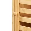 A close-up shot of a wooden cabinet door with a round knob. Anteprima dell’immagine prodotto