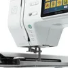 A close-up view of a white sewing machine, focusing on the needle and control panel. Produktbild-Vorschau