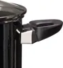 Close-up of a black pot handle and part of the pot body. Anteprima dell’immagine prodotto