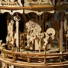 A close-up view of a wooden carousel model. Anteprima dell’immagine prodotto