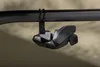 A close-up shot of a bicycle gear shifter mounted on a handlebar. Podgląd zdjęcia produktu