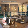 A living room scene with a floor lamp, sofa, and coffee table, demonstrating the lamp's dimming feature. Produktbild-Vorschau