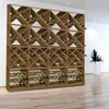 A large wooden wine rack filled with wine bottles, standing in a room with a white wall and a wooden floor. Anteprima dell’immagine prodotto