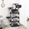 A multi-level cat tree with two cats, placed in a living room setting. Produktbild-Vorschau