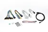 A collection of electronic cables and accessories laid out on a white background. Voir les images du produit