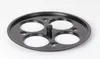 A black metal insert with four circular openings and a central hexagonal post, placed on a white background. Voir les images du produit