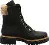 A side view of a black lace-up boot with a fur trim. Anteprima dell’immagine prodotto