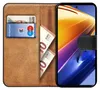 A book-style phone case is open, showing a card slot with a credit card and some euro banknotes. The phone is visible on the right side. Produktbild-Vorschau