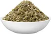 A white bowl filled with dried raspberry leaves. Produktbild-Vorschau