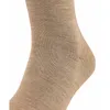 A close-up view of a beige sock. Produktbild-Vorschau