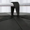 A close-up view of a black hanging net with straps attached to a metal rod. Produktbild-Vorschau
