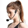 A close-up profile shot of a young woman wearing a headset microphone. Produktbild-Vorschau