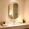Specchio da parete Zimilo ovale con cornice dorata, 70x50 Anteprima dell’immagine prodotto 1