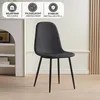 A black dining chair with metal legs is shown in a room with a white shelf unit on the left and a light-colored wall with vertical wooden slats on the right. Produktbild-Vorschau