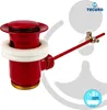A red pop-up drain and overflow set for a sink, with a white gasket and a red lever mechanism. Produktbild-Vorschau