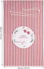 A red and white striped Christmas sack with a circular graphic in the center. Podgląd zdjęcia produktu