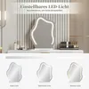 A vanity mirror with LED lighting is displayed on a dresser, with examples of different light settings shown below. Voir les images du produit