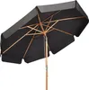 An underside view of a black patio umbrella with a wooden pole and frame, set against a white background.