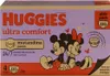 A box of Huggies Ultra Comfort diapers featuring Mickey and Minnie Mouse. Produktbild-Vorschau