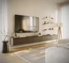A modern living room with a wall-mounted TV unit, shelves, and a floor lamp. Produktbild-Vorschau