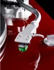 A close-up shot of a turntable's tonearm and cartridge. Anteprima dell’immagine prodotto