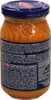 A jar of sauce with its lid. Produktbild-Vorschau