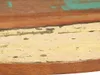 Close-up of a round wooden tabletop with a distressed finish. Anteprima dell’immagine prodotto