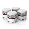 Four white smoke detectors with red accents are arranged in a group on a white background. Anteprima dell’immagine prodotto