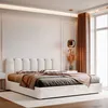 A bedroom scene with a bed and bedding. Anteprima dell’immagine prodotto