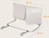 A product image showing dimensions of a baby bed rail. Voir les images du produit