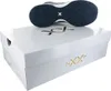 A shoe box with a shoe sole resting on top. Náhľad obrázku produktu