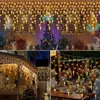 Collage of images showing icicle string lights used for outdoor and indoor decoration, including a Christmas tree and a dining table setting. Anteprima dell’immagine prodotto