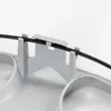 A close-up view of a black cable being secured by a gray plastic clip on a gray plastic component. Produktbild-Vorschau