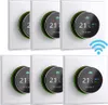 A grid of six digital thermostats mounted on white wall plates. Produktbild-Vorschau