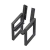 A pair of black metal bench legs shown from a slightly elevated angle against a white background. Anteprima dell’immagine prodotto