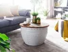 A living room scene with a coffee table as the main focus. Produktbild-Vorschau