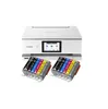 A white Canon printer is shown with two sets of ink cartridges in front of it. Produktbild-Vorschau