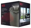 A product box for an AEG air purifier filter, showing the filter itself and a lifestyle image of an air purifier in a modern living room. Produktbild-Vorschau