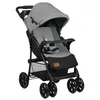 A grey and black baby stroller is shown against a white background. Podgląd zdjęcia produktu